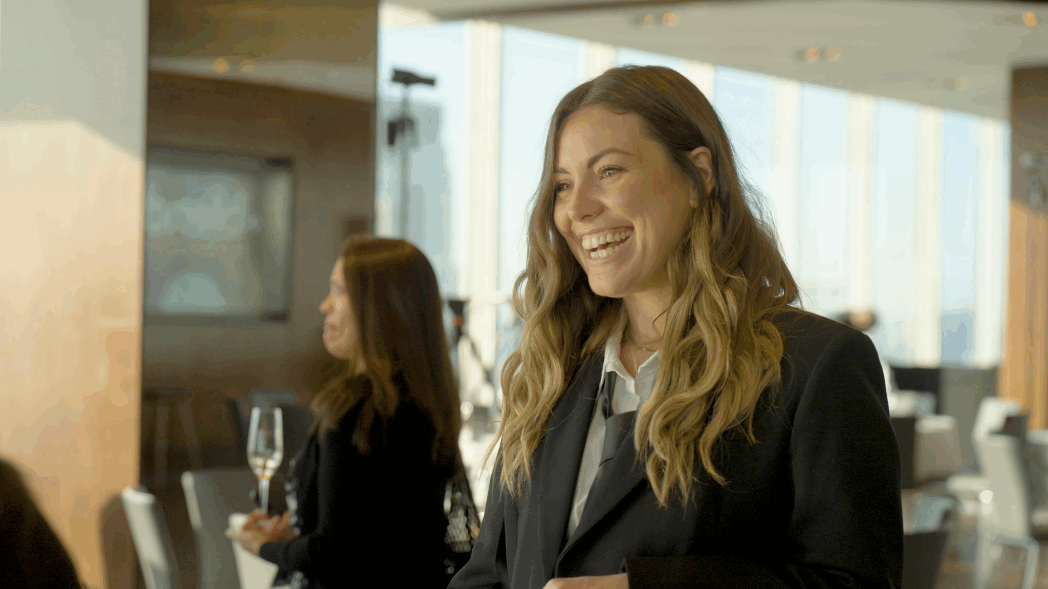 A C-suite professional enjoys a Blend community networking event.